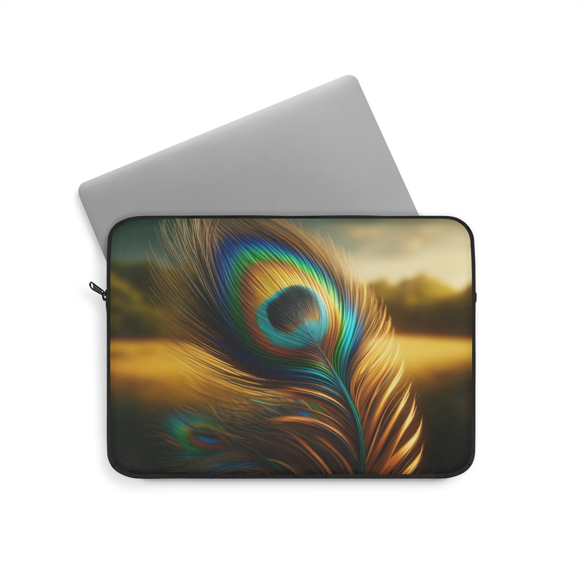 A golden-green peacock feather in the field - Laptop Sleeve